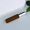 Frosted amber bottle + silver sprayer