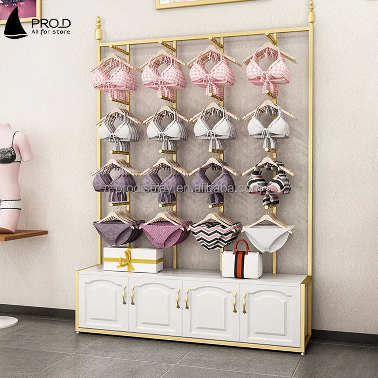 Gold Wall Underwear Rack: Bra Display Rack Hanging On The Side In