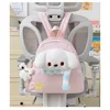 Pink backpack charm