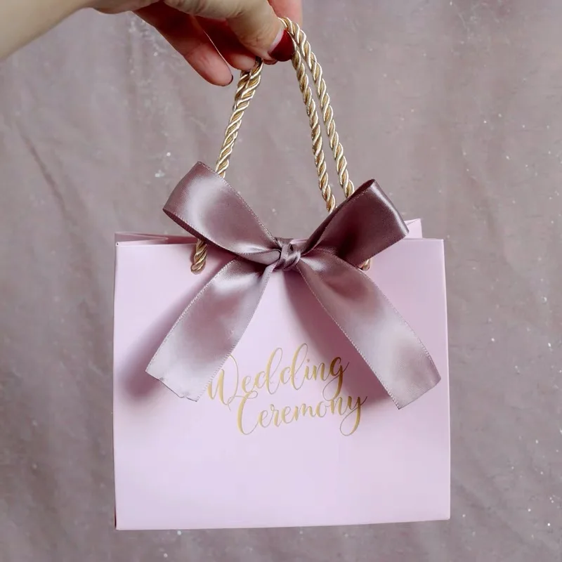 Wholesale Paper Gift Bag Packaging Wine Jewelry Bag Luxury Gold Foil  Embossed Baby pink Gift Shopping Paper Bag