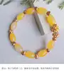 1 yellow bracelet