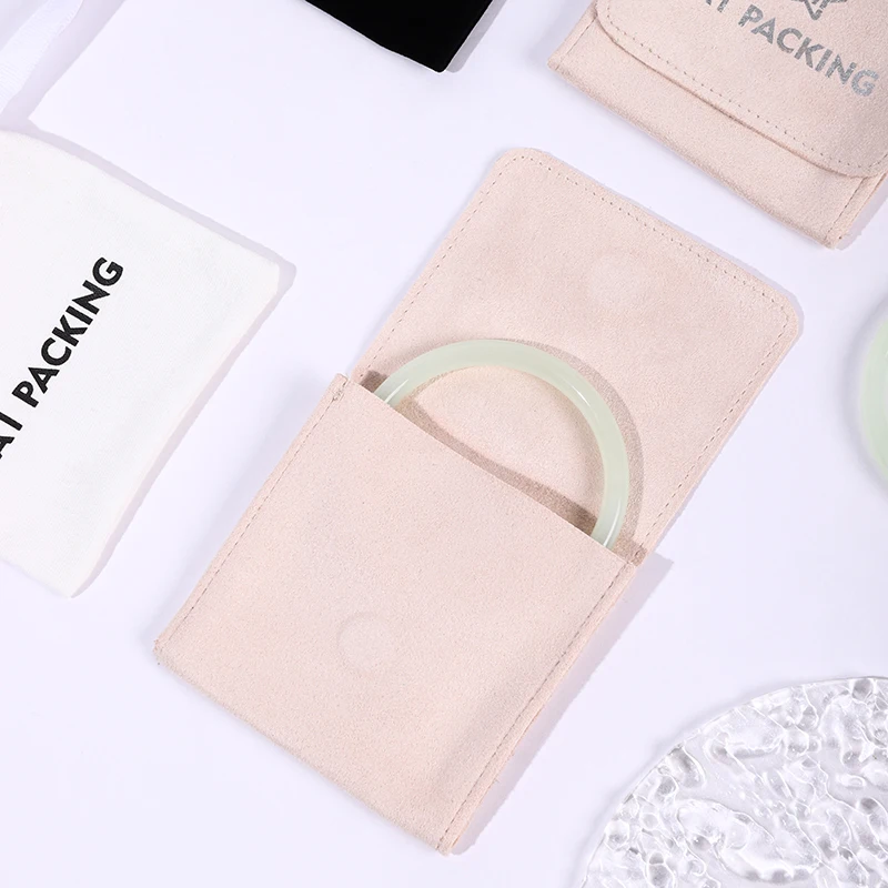 A1 Luxury Paper Jewelry Gift Bags Drawstring Pouch Storage Package Rings Necklaces Bracelets CMYK/Pantone Color Embossed Logo supplier