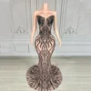 Maglia nuda con pietra nera