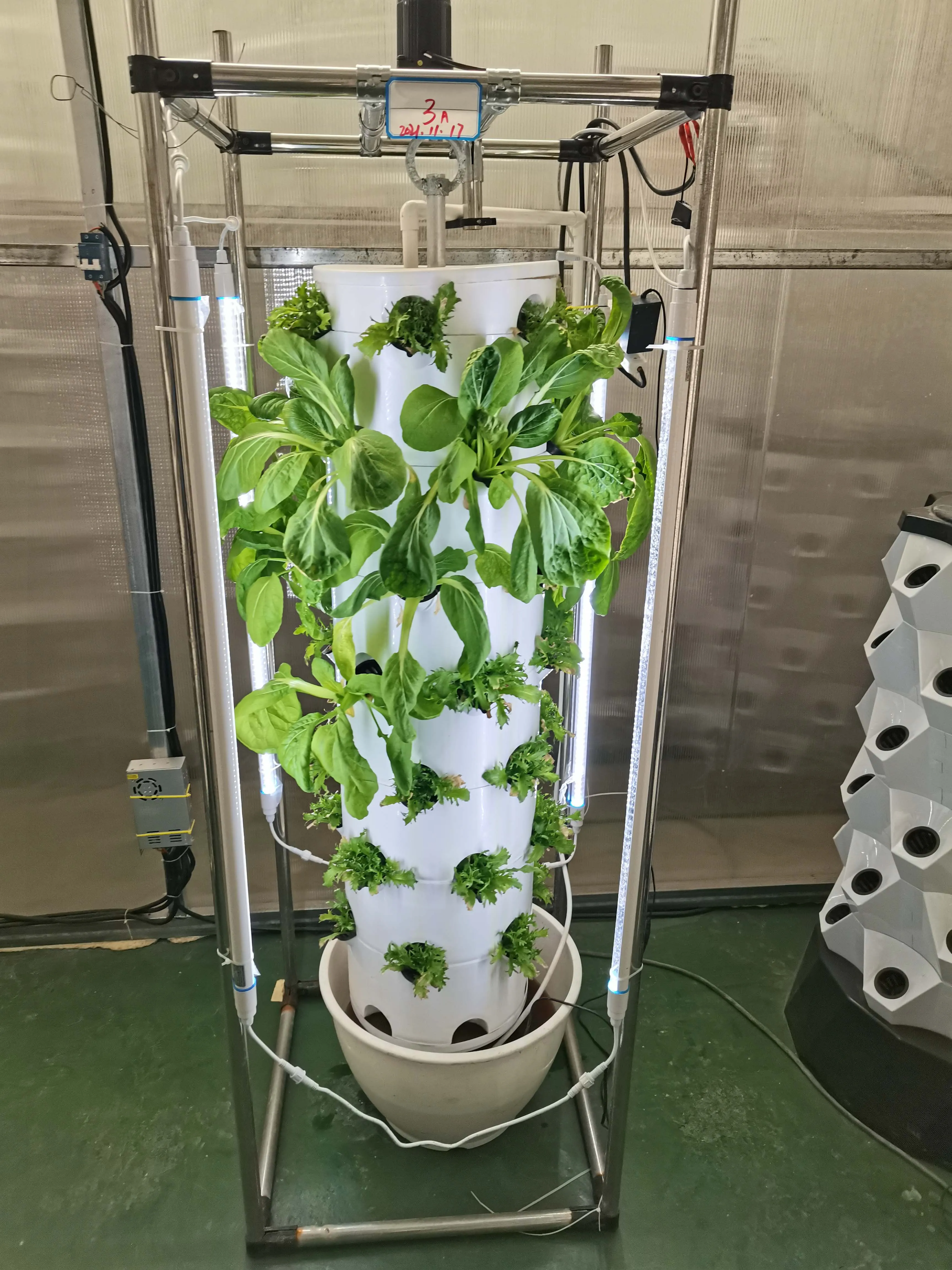 Hydroponic Rotating Garden Tower Vertical Hanging Column Farming Hydroponic Equipment for Planting Vegetables