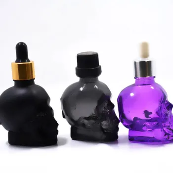 Factory wholesale 60ml creative skull shape essential oil bottle special-shaped glass bottle dropper bottle 30ml