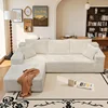 Chaise beige orientada hacia la izquierda