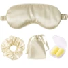 Antifaz y bolsa beige, gomas para el pelo y tapones para los oídos.