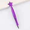 Bolígrafo tipo bala 1.0 - 15 estrellas de cinco puntas moradas
