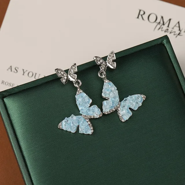 Rolling Stone Crystal super flash super fairy butterfly wing stud design high-grade sense light luxury earrings wholesale