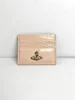 Apricot color alligator-patterned card holder