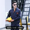 Navy blue top with orange pocket