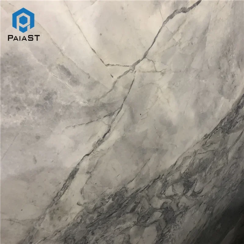 Tiles b’vejni abjed fuq ħaġra ħamra grigja għall-kontertop ta’ marmur, f’Franza