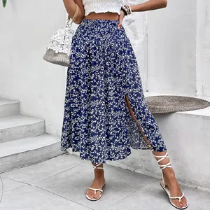 The 2025 summer blue printed slit skirt with a tight waist and elegant vacation floral print dress is a bestseller for women