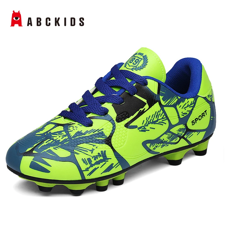 green kids football boots