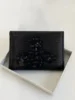 Black Saturn toothpick pattern card holder