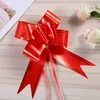 One red and gold thread ribbon, number 49
