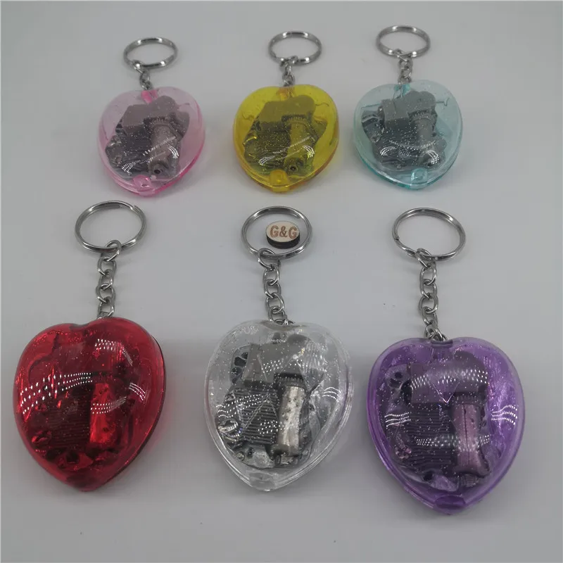 工場カラフルなワインドアップオルゴールキーホルダークリア