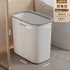 Medium-sized white bathroom trash can (no lid, flush design)