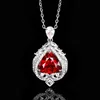 Red corundum pendant with cross chain