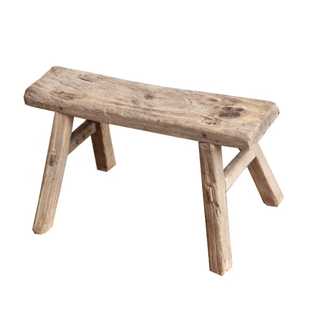 rustic wooden milking stool