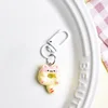 white cat donut + door knob