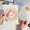 Diamond-studded clock cake-music-lights