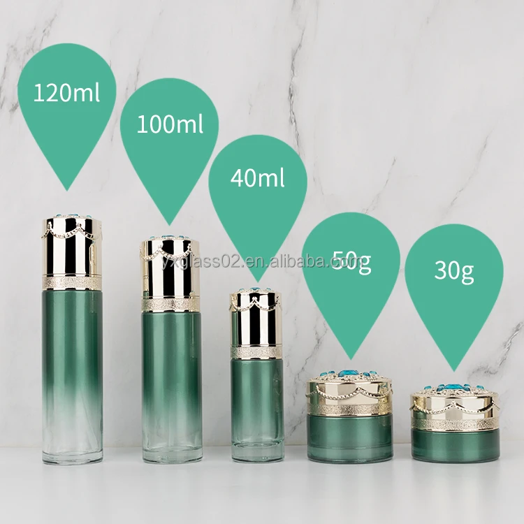 Cosmetic glass bottle set skincare cosmetic packaging glass container with Luxury lid carving craft pump spray cap manufacture