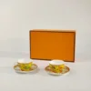 Taza y plato doble amarillo