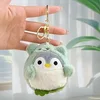 Pingüino travesti verde + hebilla dorada