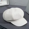 White eight-pointed cap