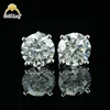 Boucles d'oreilles en or 18 carats avec diamant taille ronde et sertissage 4 griffes