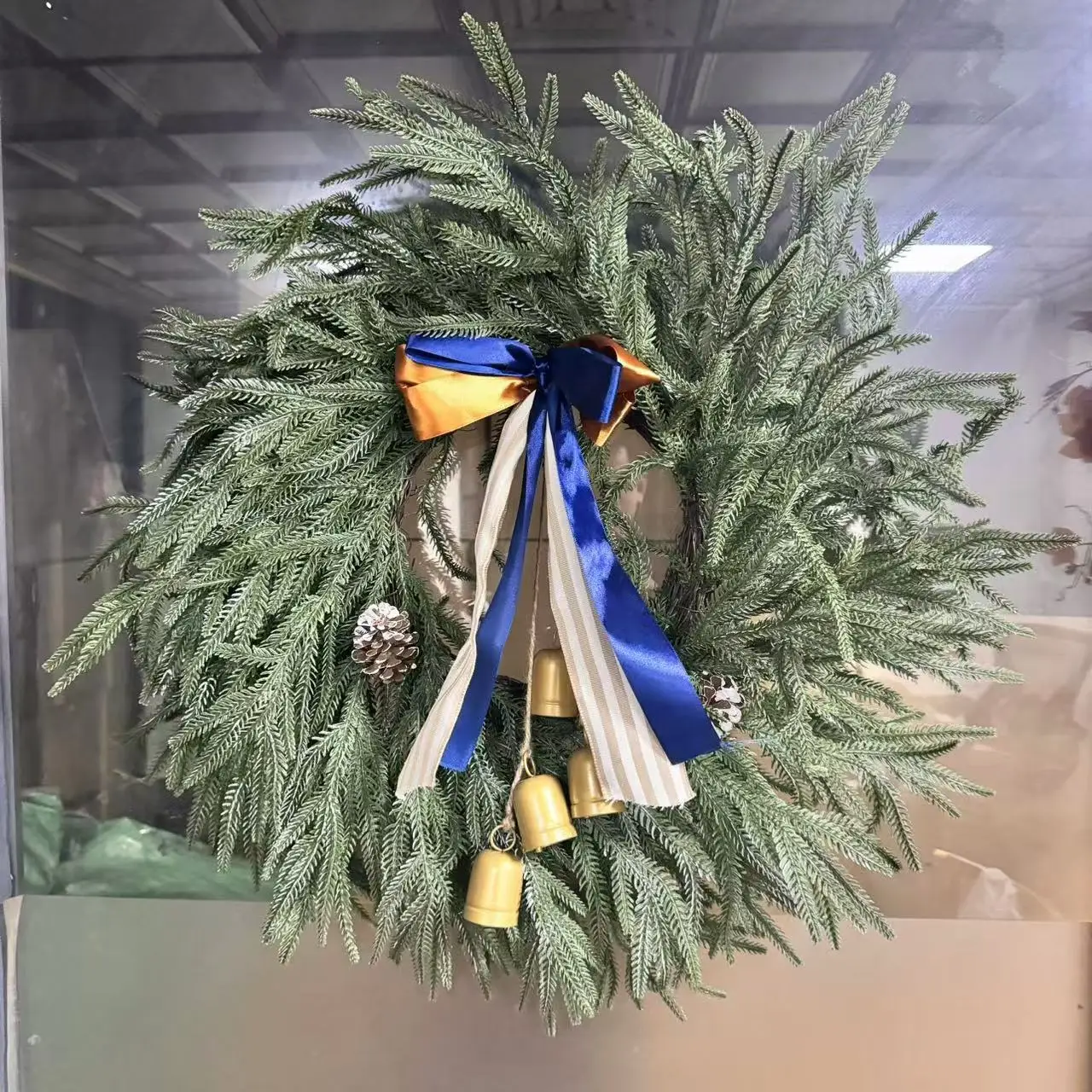 Wholesale Luxury Christmas Wreath Blue Bow Metal Bells Pine Cone Christmas  Outdoor Wall Decoration Wreath, image size:1280x1280