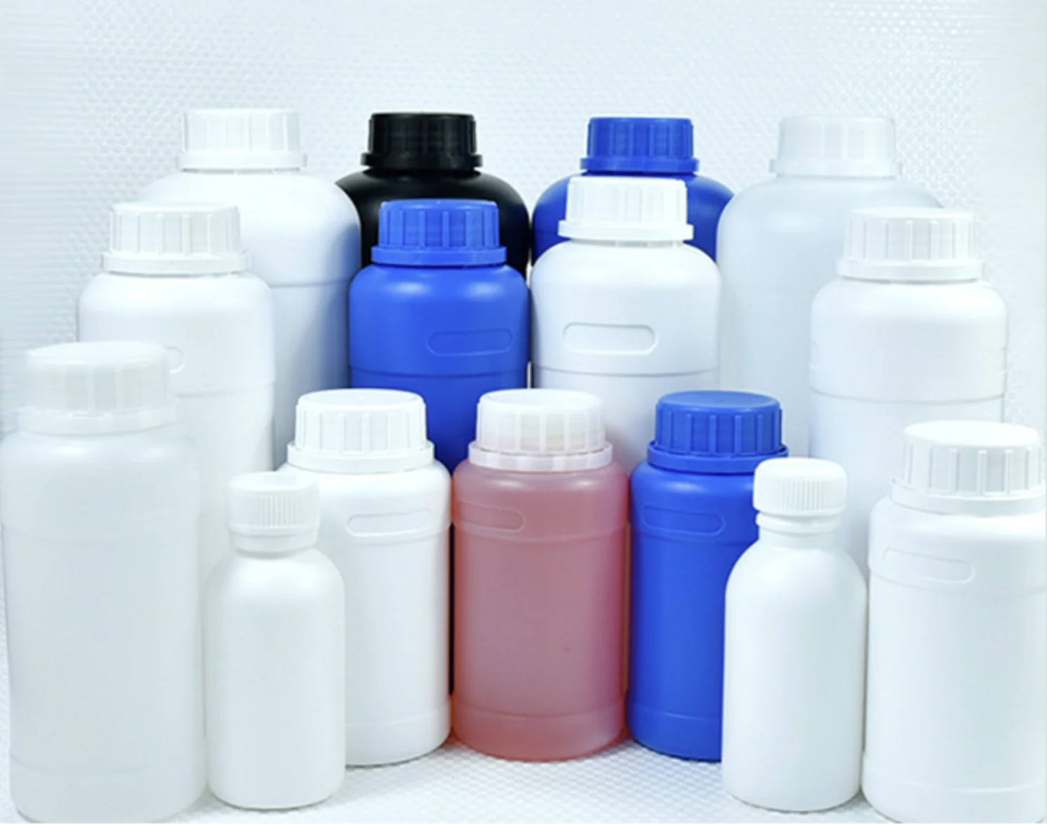 botella del HDPE 1000ml gruesa alrededor de la botella fluorada de la Anti-infiltración blanca plástica anticorrosión de la botella