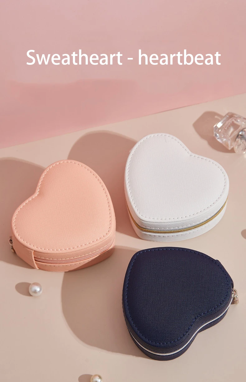 Organized padded storage compartments Interior compartments of heart jewelry organizer
