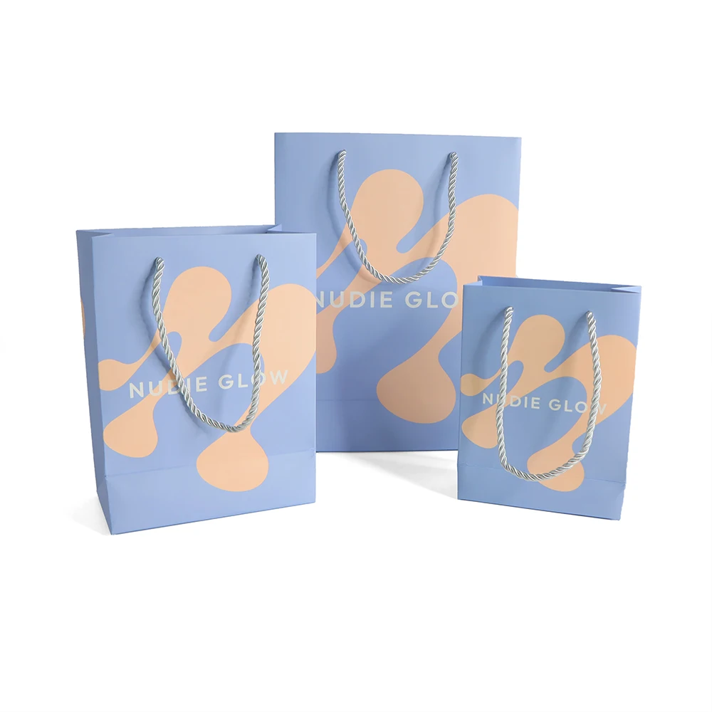Custom  Logo Luxury Ivory Paper Apparel Packaging Gift Shopping Bag With Rope Handle