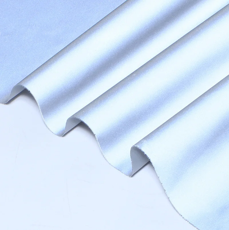 Fabricação de tecido 100% poliéster prata reflexivo de 220 g / m² para roupas