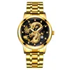 Black dial, gold case, gold bracelet