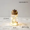 Pequeña botella de cristal con forma de árbol de Navidad