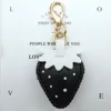 Black and white leaf lobster clasp