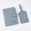 light blue holder+tag