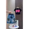 polvere nera farfalla manica corta denim strappato di media lunghezza