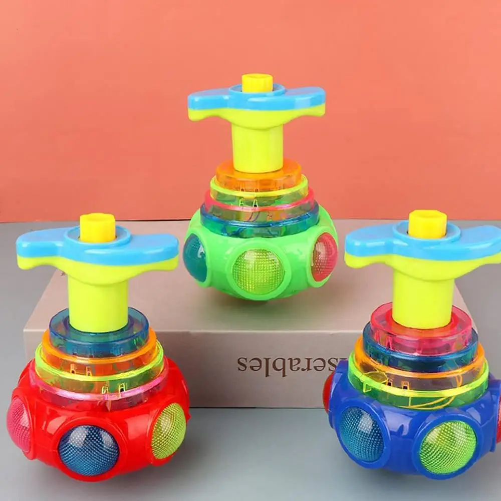 Popular LED Light up Flashing UFO Bouncing Spinning Tops With Gyroscope Novelty Bulk Children Toys Party Favors Funny Toys