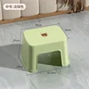 Medium-sized square stool in refreshing green.
