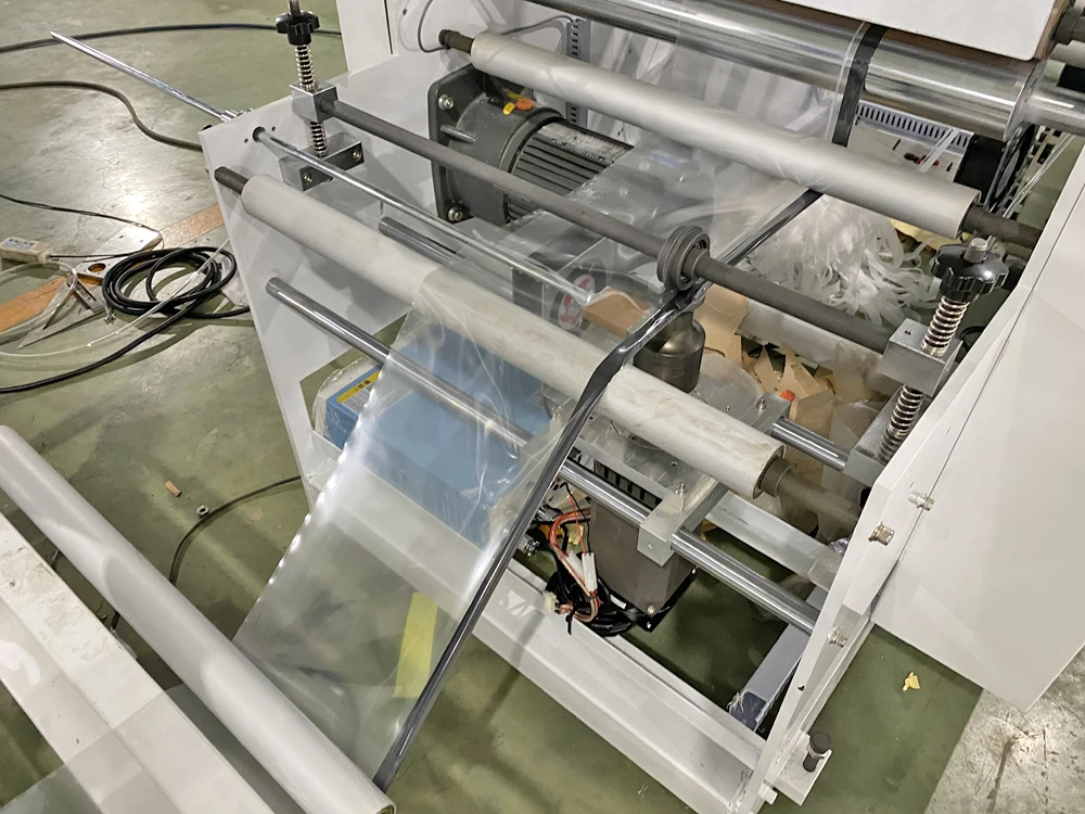 High Speed Poly Sheet Folding Melting Film Edge System Automatic Bag Making Machine Opp Bopp Bag Making Machine