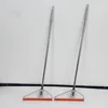 Orange triangular scraper