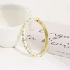 gold flowing sand white green