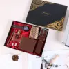 Set da 9 pezzi: orologio color caffè, cinturino in pelle, portafoglio, cravatta, fermacravatta