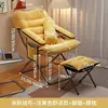 Yellow, thickened armchair cushion and footrest