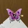 Embalaje DIY estilo mariposa, morado y sin protección.