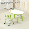 Une table et une chaise vert ardoise blanc